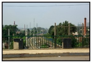 A glimpse of the railway through a bus window.